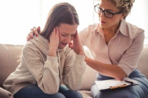 teen girl beginning trauma counseling