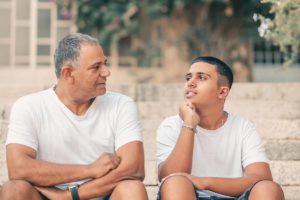 a father takes an opportunity to help improve his teen sons mental health