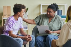 a teen gets the professional help and support he needs from a mental health counselor in a cognitive behavioral therapy program