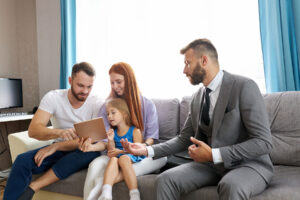 male therapist explaining to young family the 7 family therapy activities to build trust with your teen