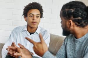 adolescent male experiencing the benefits of interventions for teenagers from older adult male